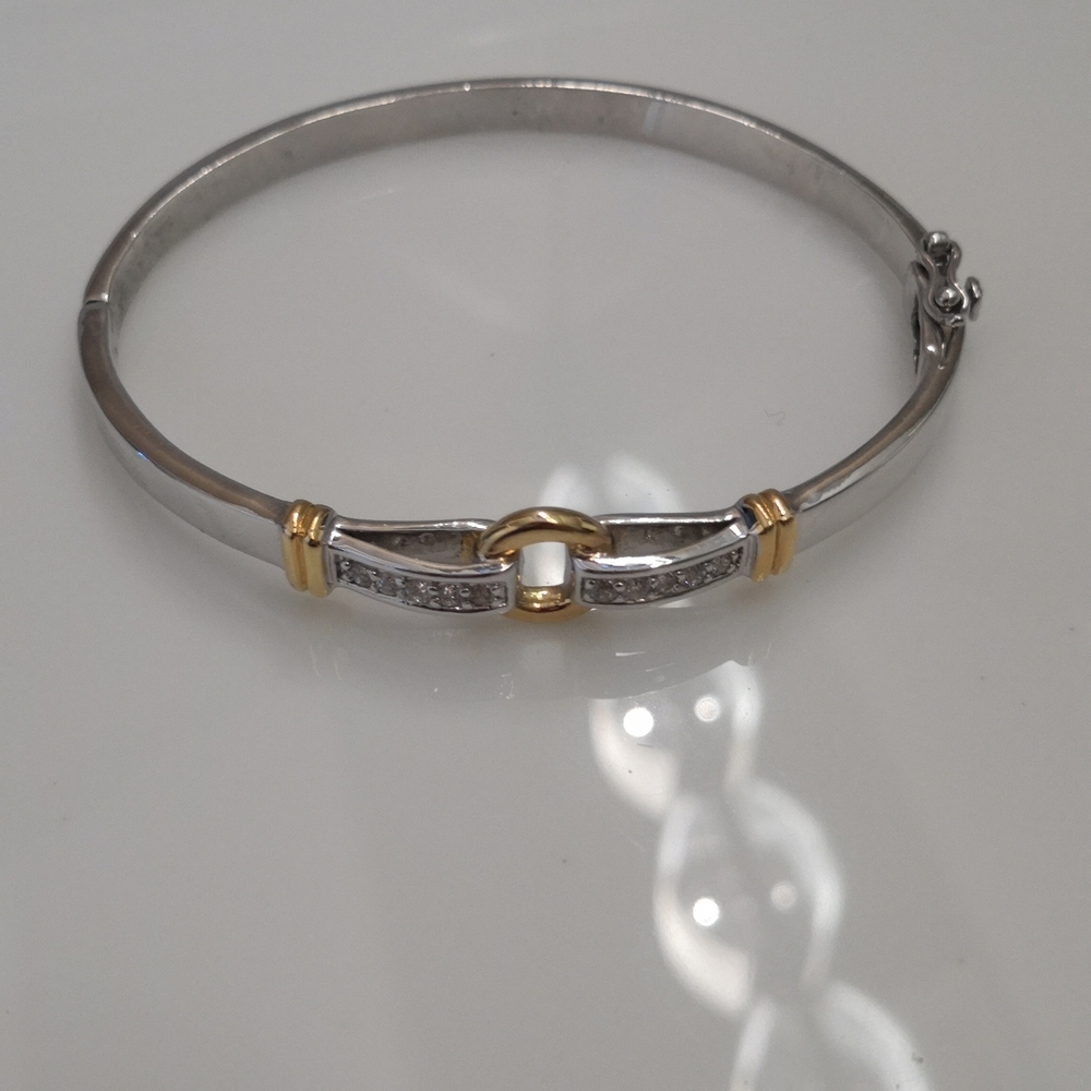 Silver and gold oval bangle with rhinestones